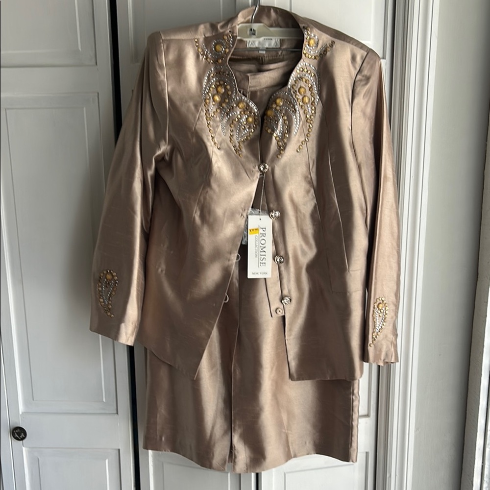 Tan 2pc suit.     Size 14. NWT